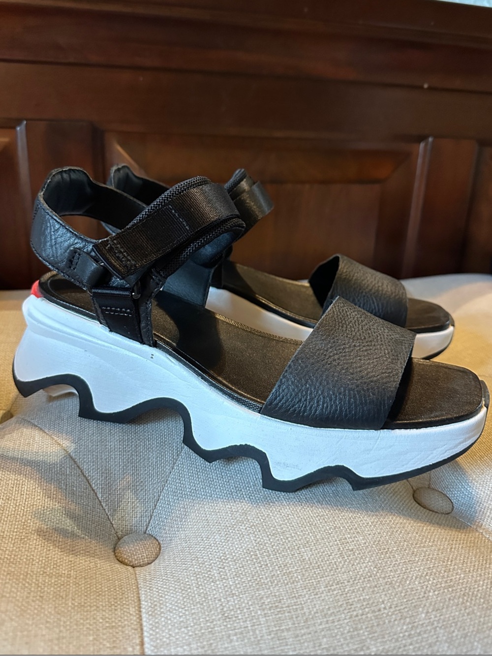Sorel Black Leather Platform Sandals with White Wave Sole and Red Heel Tab